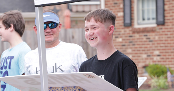 Ames, a teenager from Chesapeake, Virginia, was surprised with a “promise parade” during summer 2020. Ames’ wish to visit Disney World was funded by Chartway’s We Promise Foundation and fulfilled by Toby’s Dream Foundation. Due to COVID-19, his wish was temporarily postponed, so Chartway’s We Promise Foundation held the surprise parade to bring him joy and smiles in the meantime.