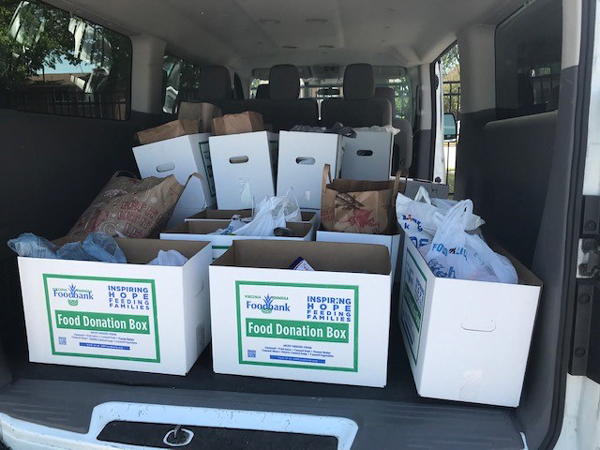 Shred Day in action and the vehicle filled with our food collection for VA Peninsula Foodbank.
