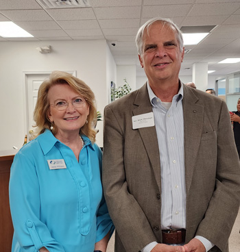 UVA Community CU's Janine Williams (also Secretary for the Virginia League's Board of Directors) with Sen. Mark Obenshain.